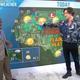 Englishman gestures excitedly at forecast calling for cloudy weather.
